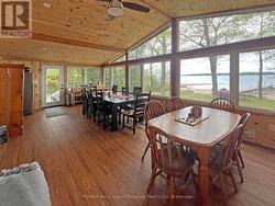 Large family room/sunroom overlooking water -
