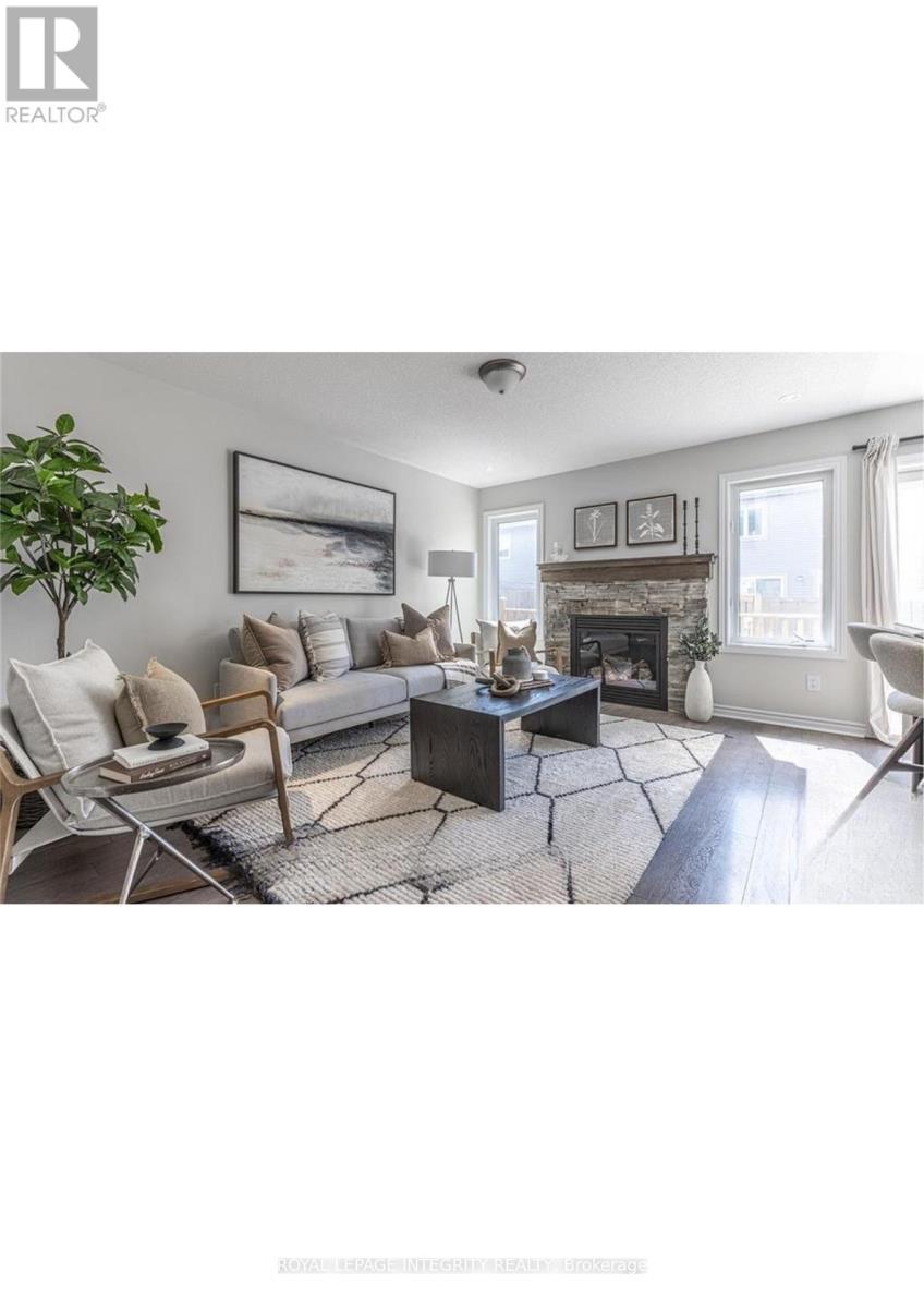 2435 River Mist Road, Ottawa, ON - Indoor Photo Showing Living Room With Fireplace