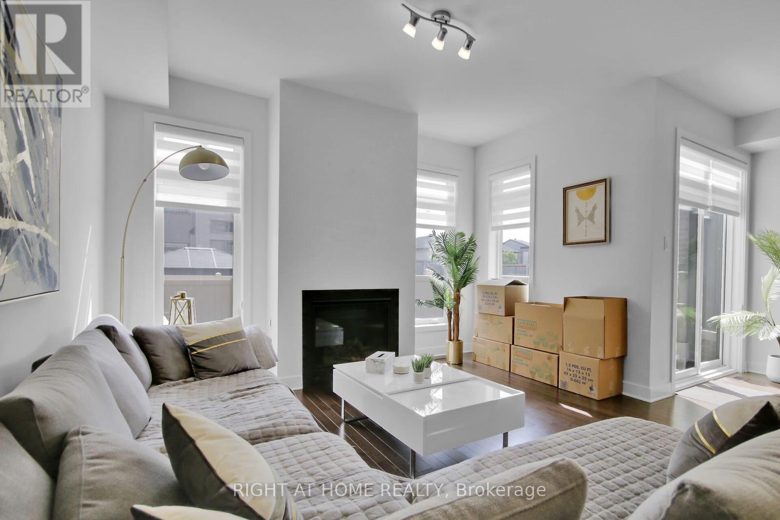 741 Twist Way, Ottawa, ON - Indoor Photo Showing Living Room With Fireplace