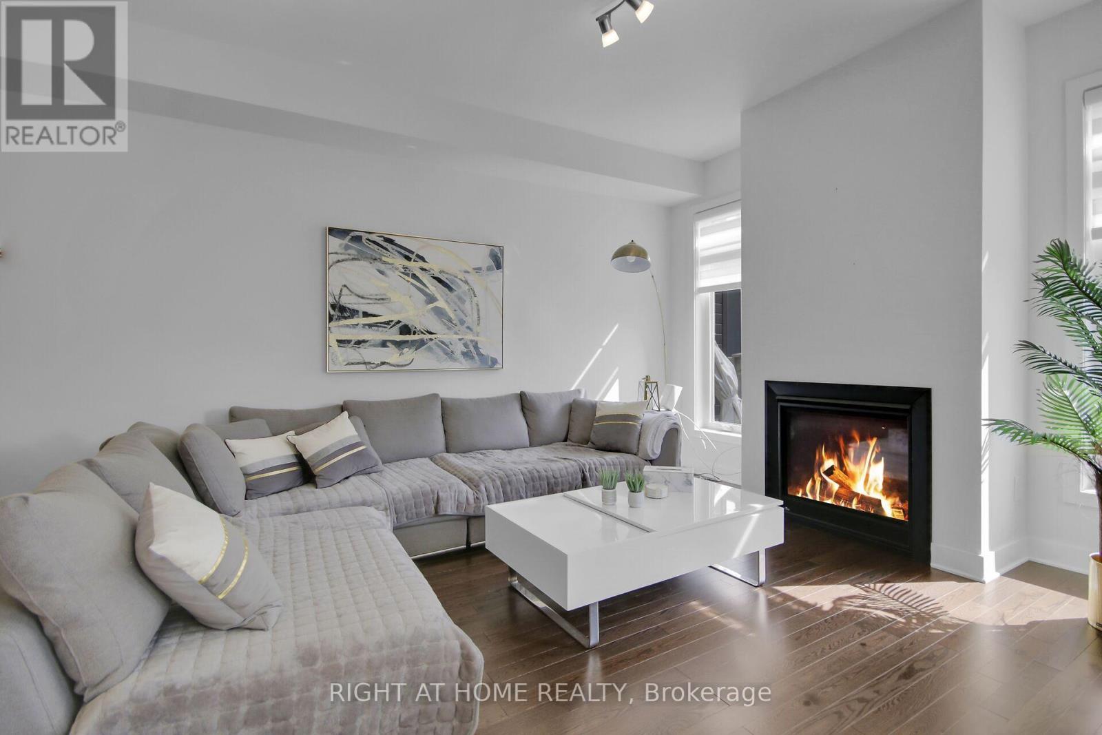 741 Twist Way, Ottawa, ON - Indoor Photo Showing Living Room With Fireplace