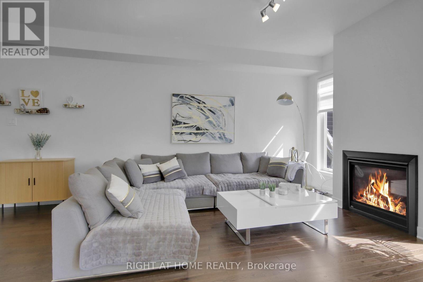741 Twist Way, Ottawa, ON - Indoor Photo Showing Living Room With Fireplace