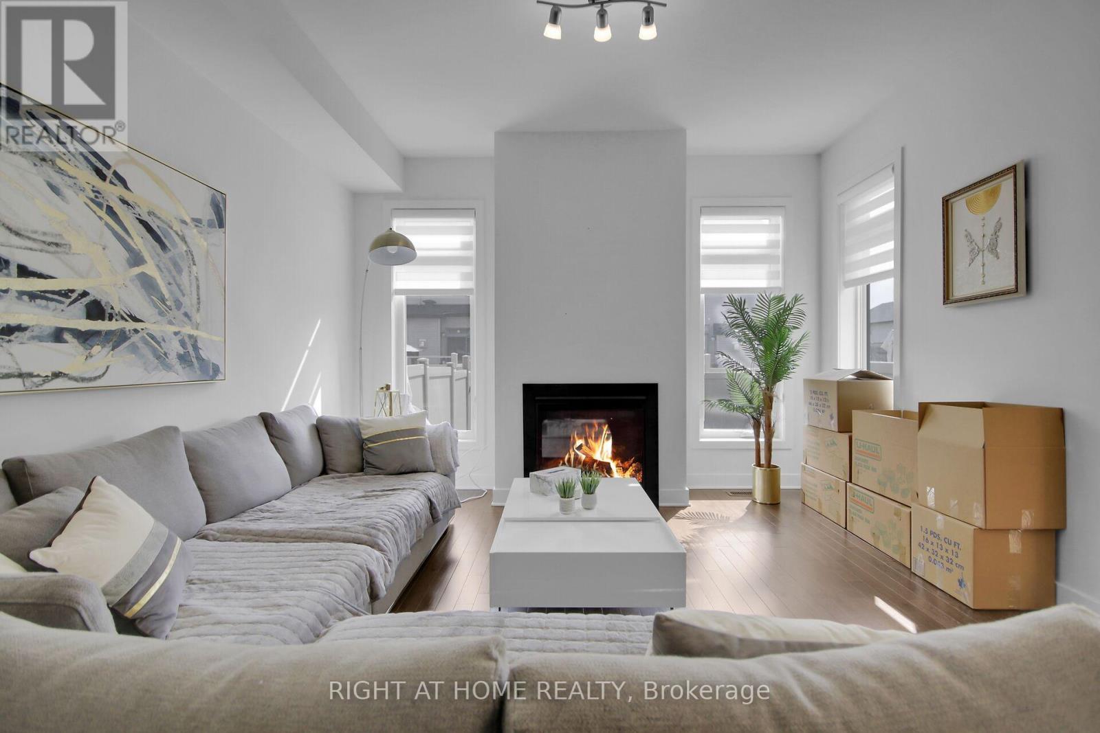 741 Twist Way, Ottawa, ON - Indoor Photo Showing Living Room With Fireplace