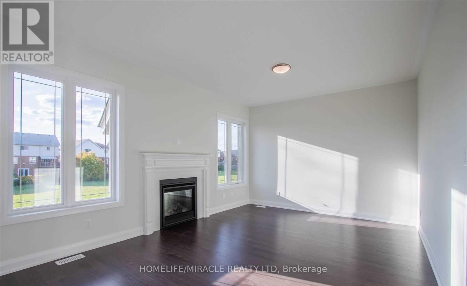 Upper - 530 Askew Court, Oshawa, ON - Indoor Photo Showing Living Room With Fireplace
