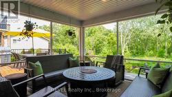 Screened in porch overlooking gorgeous back yard -