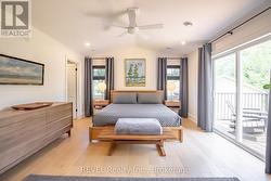 Primary suite - with patio door to balcony -