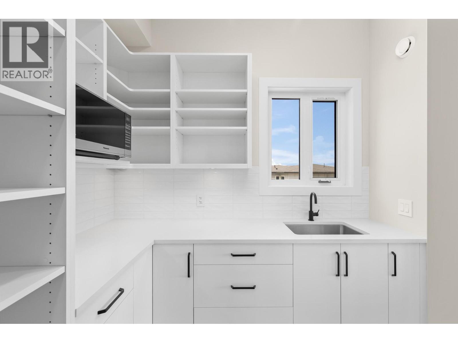 Pantry off kitchen - 4964 Bucktail Lane, Kelowna, BC - Indoor