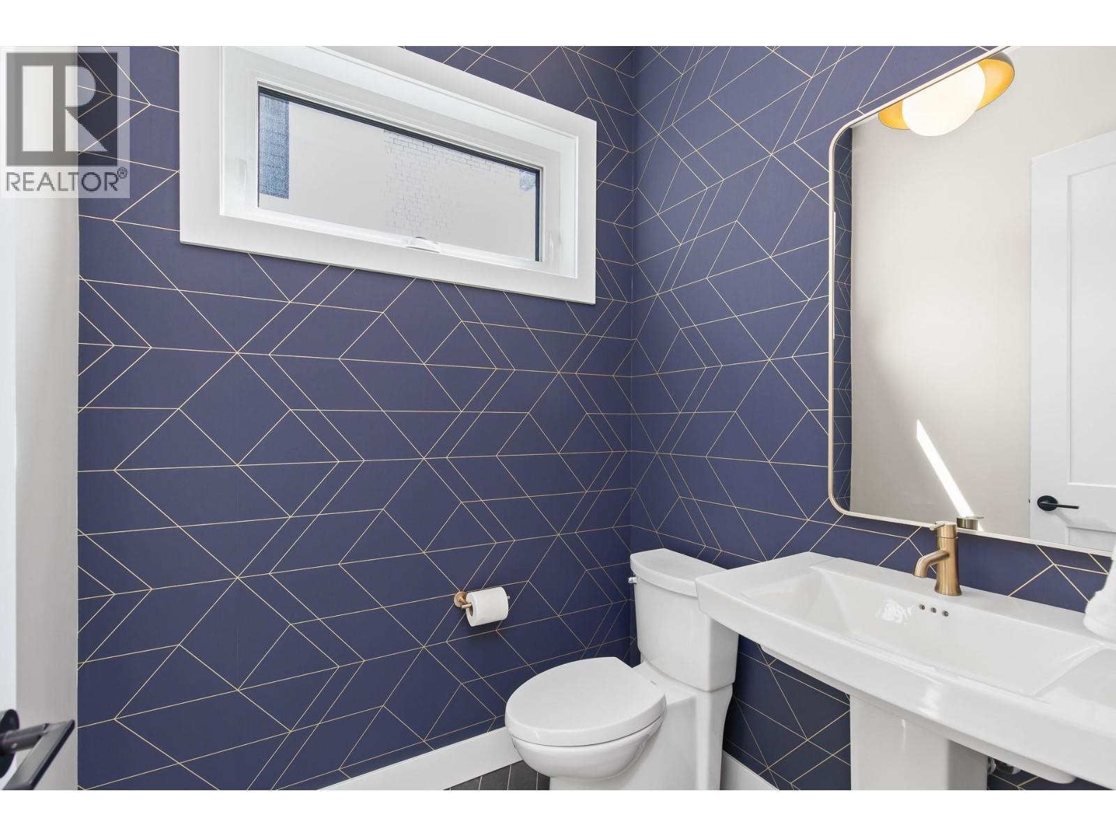 Main level powder bathroom - 4964 Bucktail Lane, Kelowna, BC - Indoor Photo Showing Bathroom