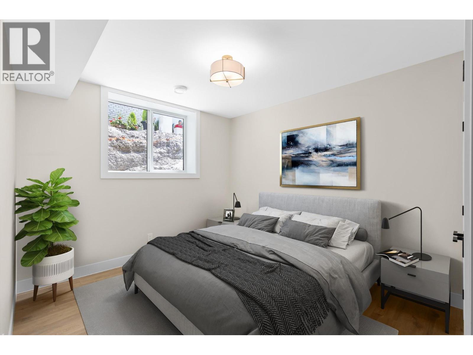 Lower level bedroom 2 - Virtually staged. - 4964 Bucktail Lane, Kelowna, BC - Indoor Photo Showing Bedroom
