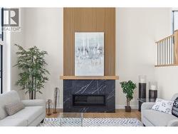 Elegant detail on fireplace in living room. -