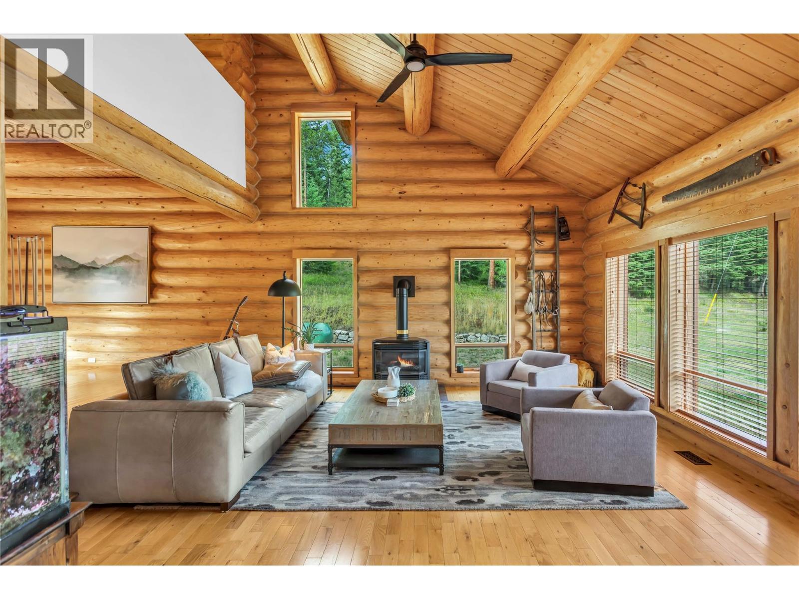 5738 Goudie Road, Kelowna, BC - Indoor Photo Showing Living Room With Fireplace