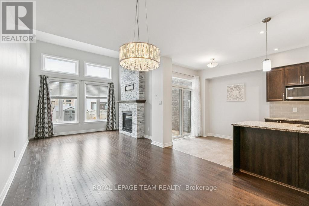 525 Rowers Way, Ottawa, ON - Indoor Photo Showing Other Room With Fireplace