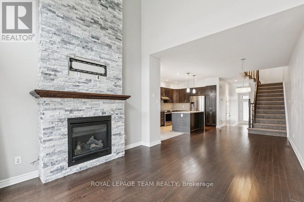 525 Rowers Way, Ottawa, ON - Indoor Photo Showing Living Room With Fireplace