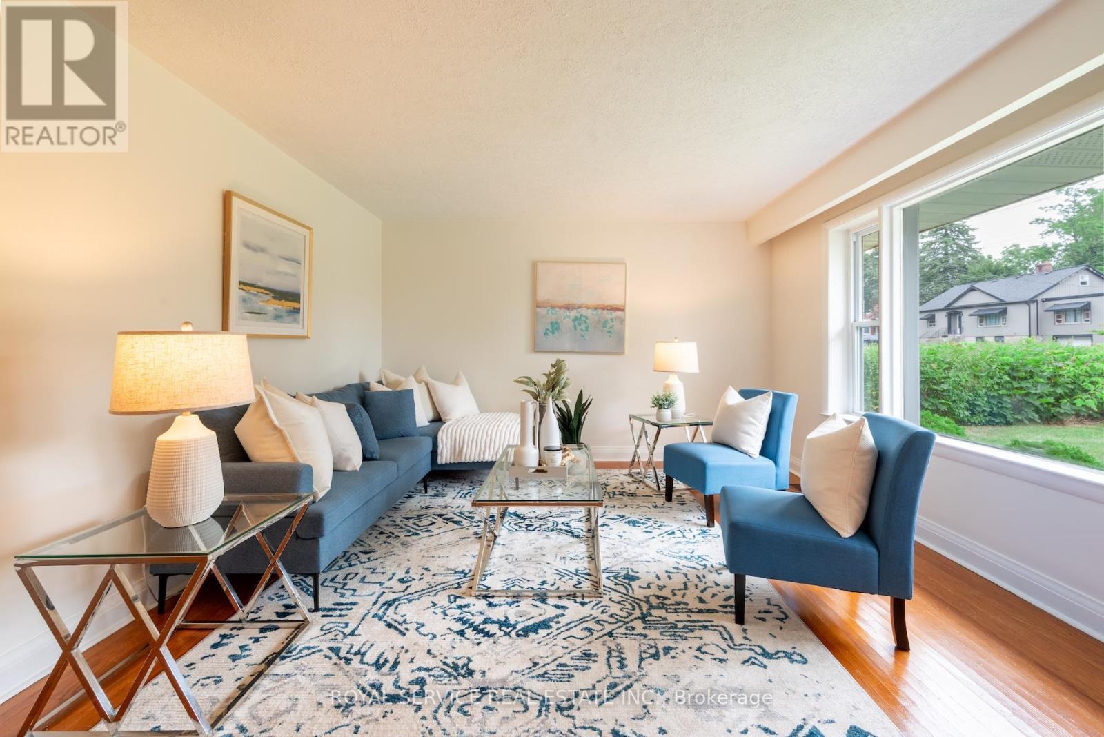Bright living room with picture window - 24 Division Street, Cramahe (Colborne), ON - Indoor Photo Showing Living Room
