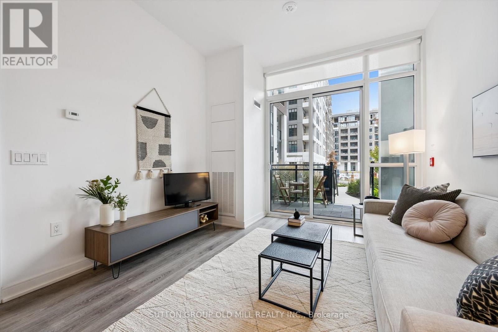 101 - 25 Neighbourhood Lane, Toronto, ON - Indoor Photo Showing Living Room