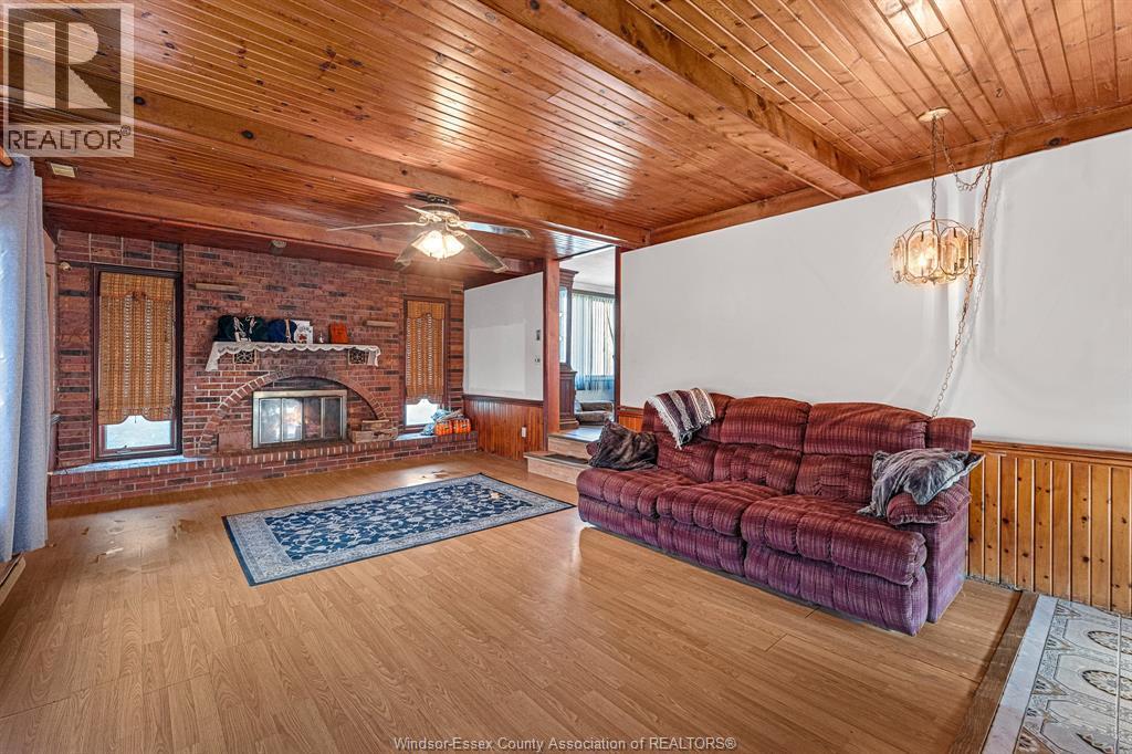 3425 County Rd 42, Windsor, ON - Indoor Photo Showing Living Room With Fireplace