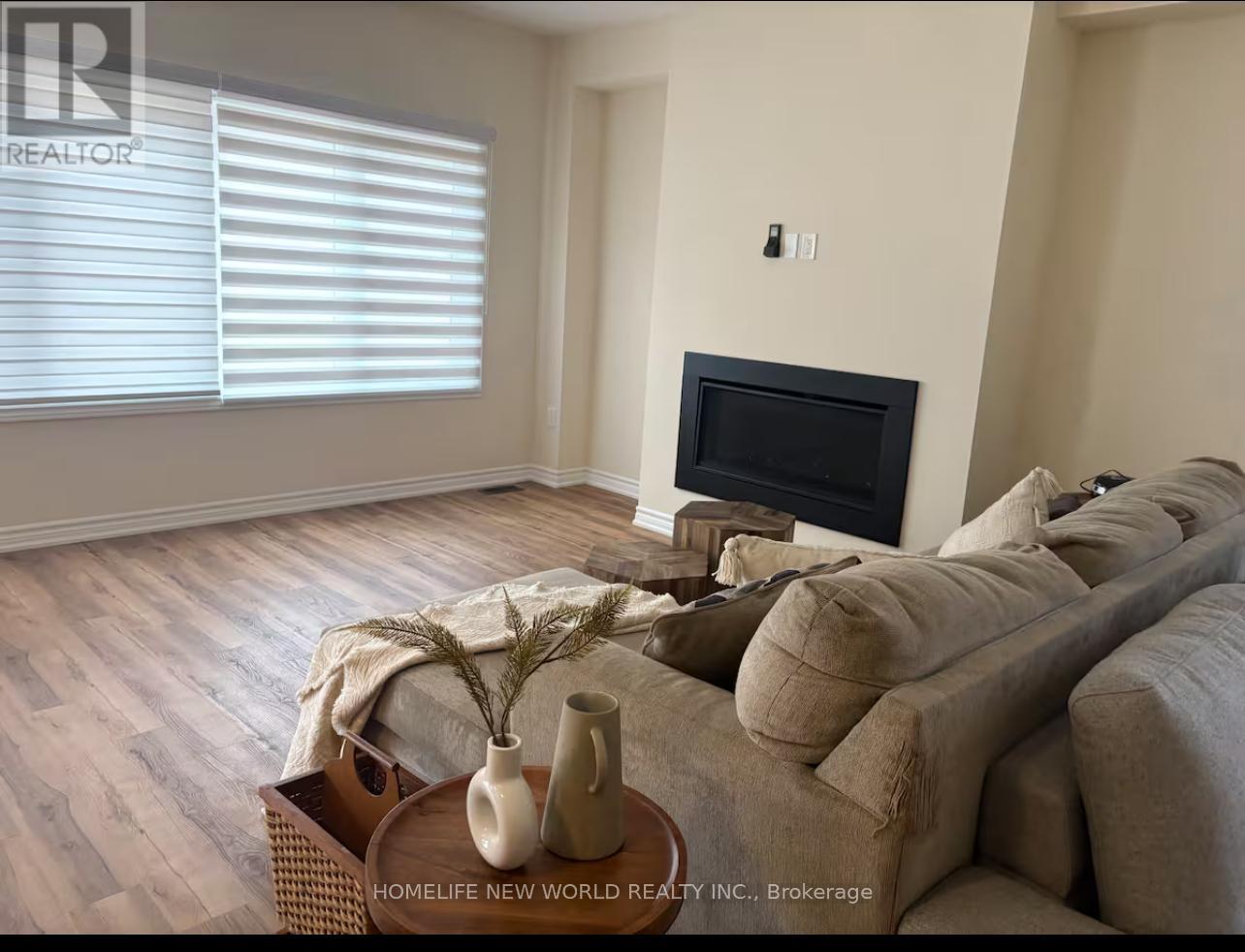 325 Mceachern Lane, Gravenhurst, ON - Indoor Photo Showing Living Room With Fireplace