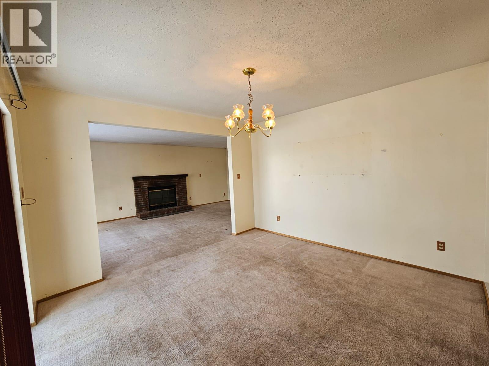 128 Kiskatinaw Crescent, Tumbler Ridge, BC - Indoor With Fireplace