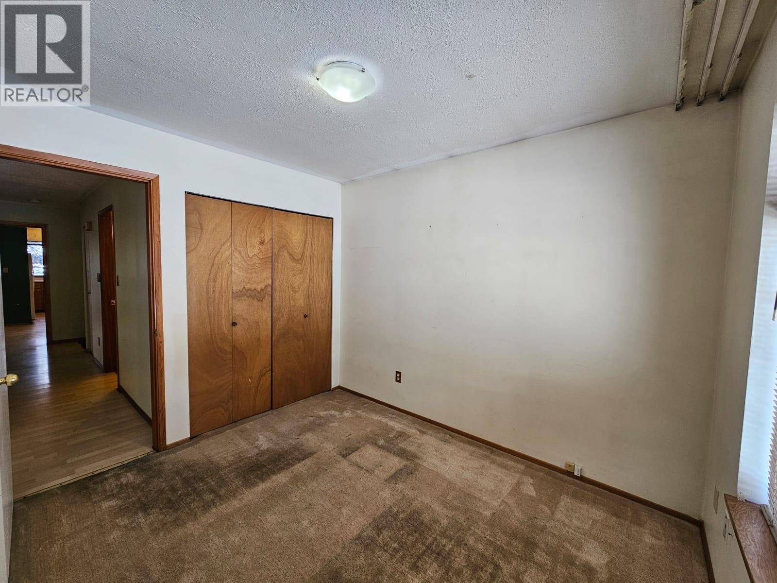 128 Kiskatinaw Crescent, Tumbler Ridge, BC - Indoor Photo Showing Other Room