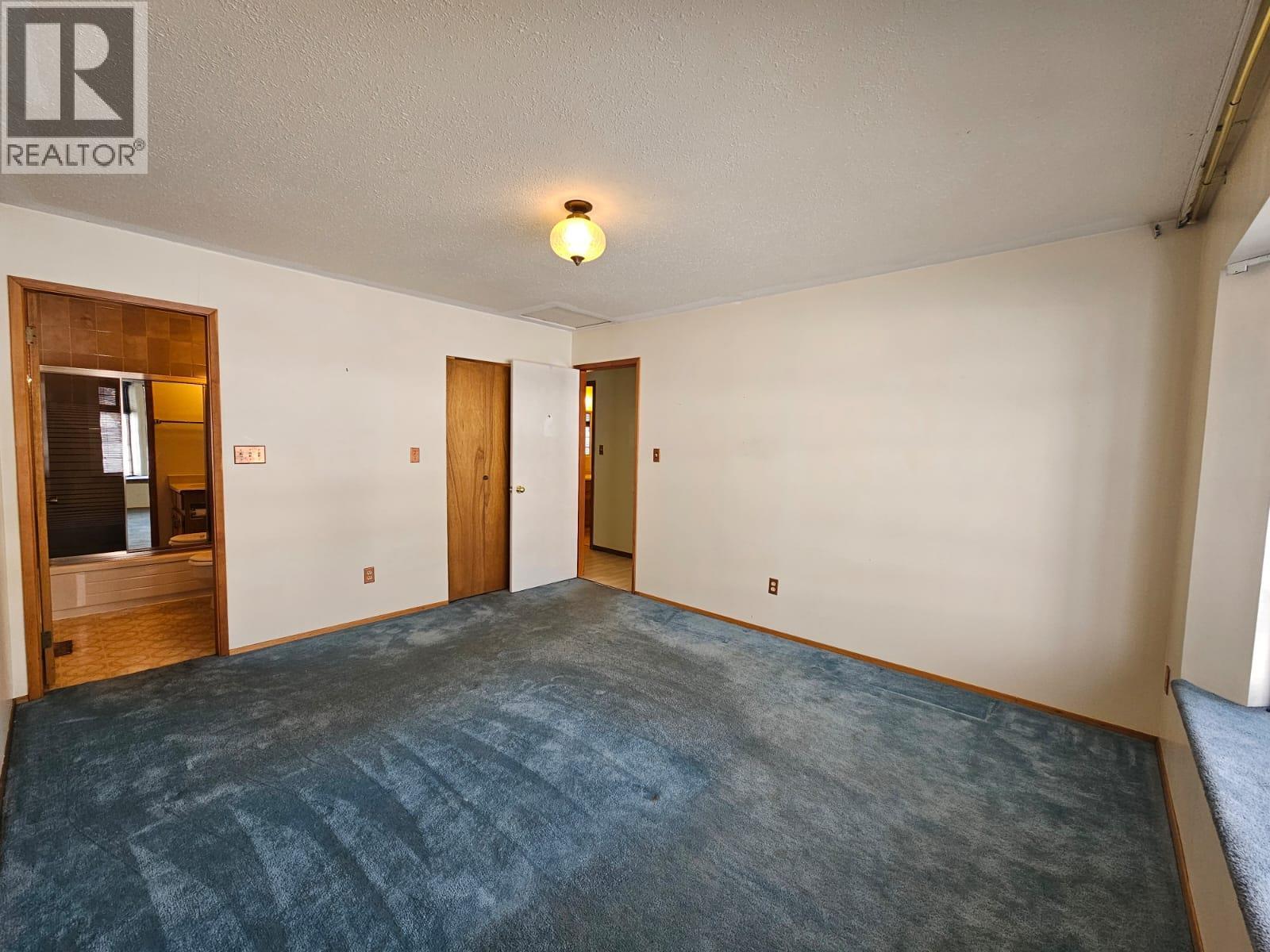 128 Kiskatinaw Crescent, Tumbler Ridge, BC - Indoor Photo Showing Other Room