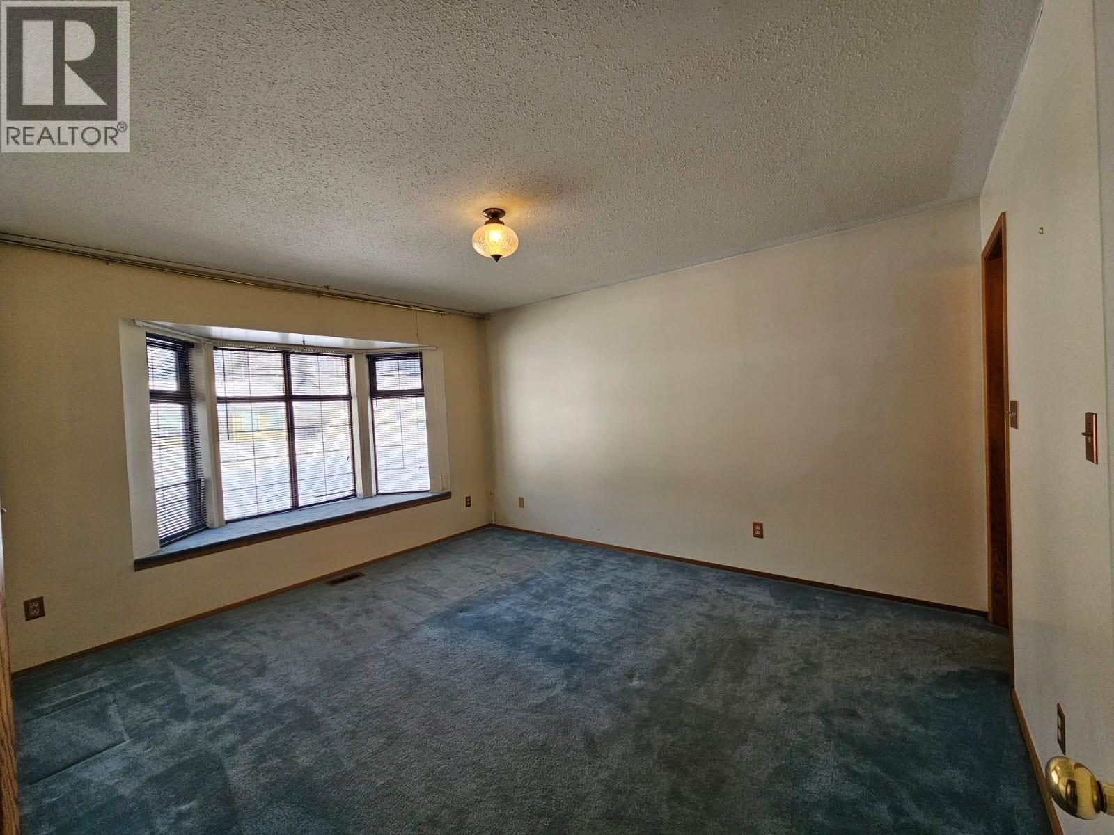 128 Kiskatinaw Crescent, Tumbler Ridge, BC - Indoor Photo Showing Other Room