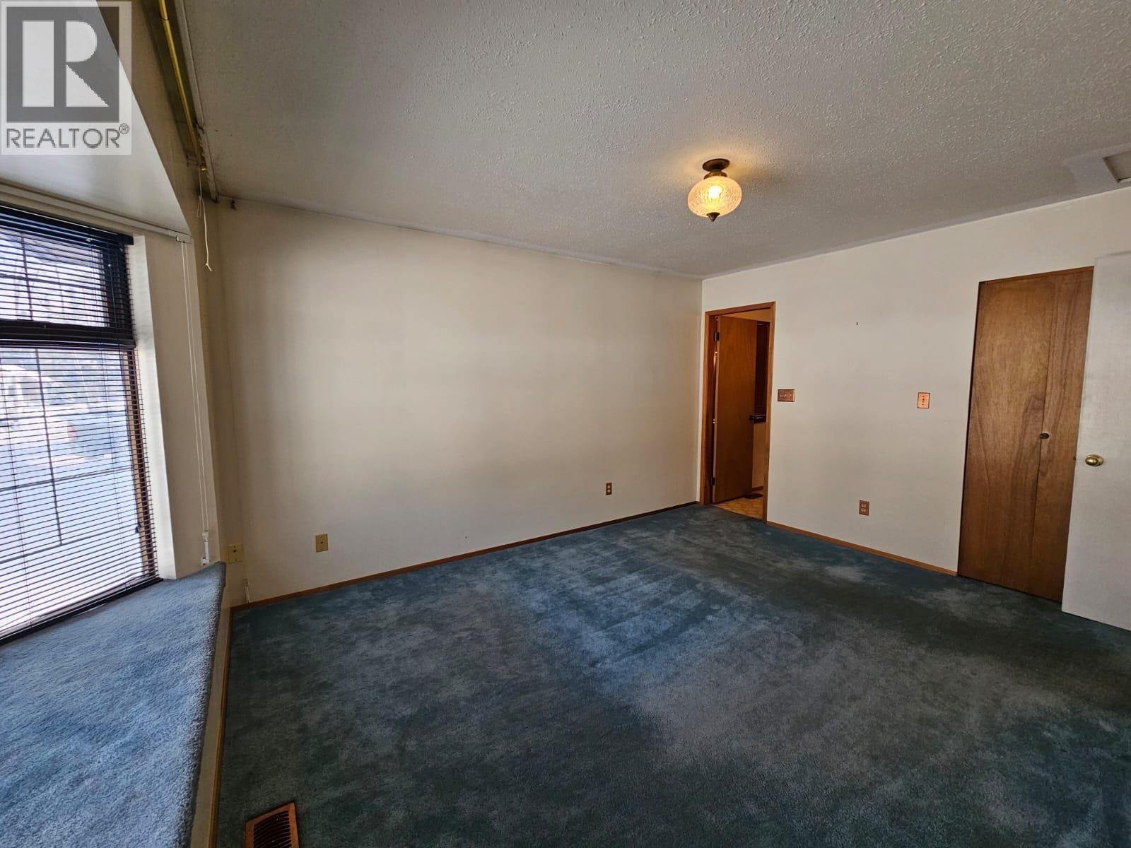 128 Kiskatinaw Crescent, Tumbler Ridge, BC - Indoor Photo Showing Other Room