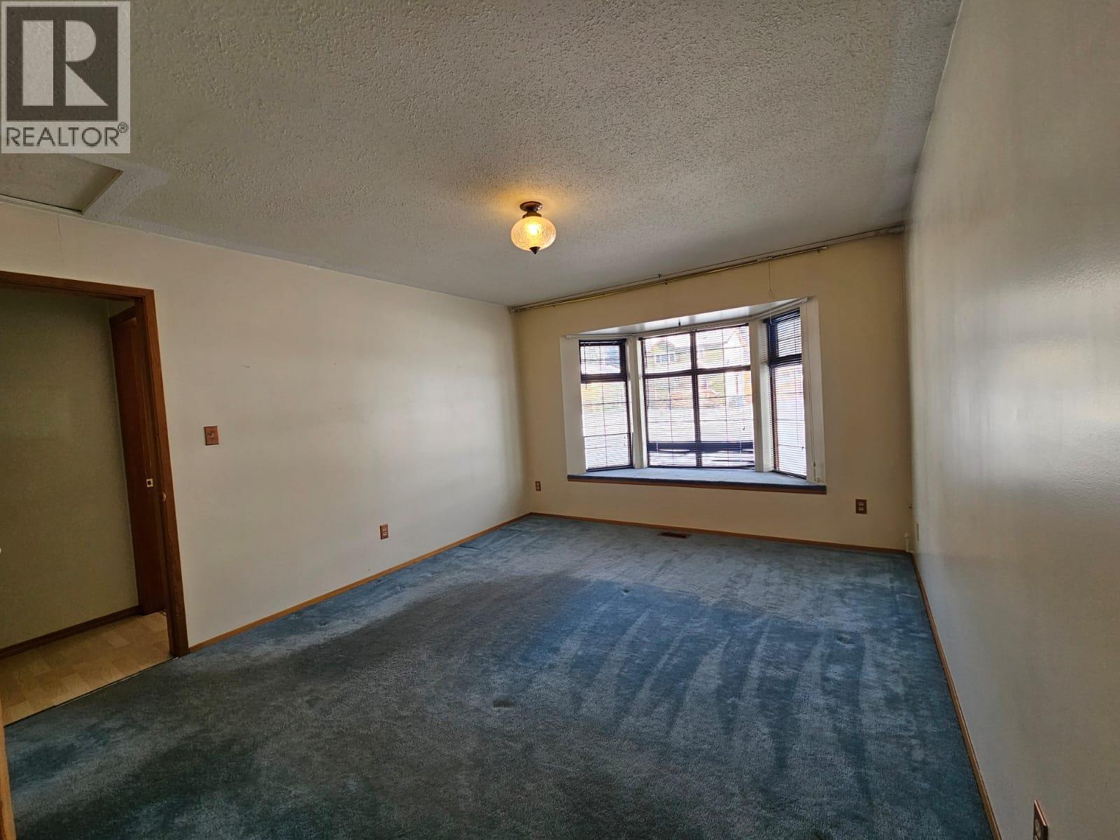 128 Kiskatinaw Crescent, Tumbler Ridge, BC - Indoor Photo Showing Other Room