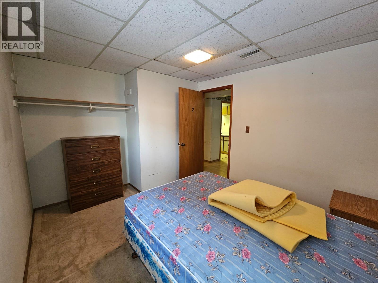 128 Kiskatinaw Crescent, Tumbler Ridge, BC - Indoor Photo Showing Bedroom