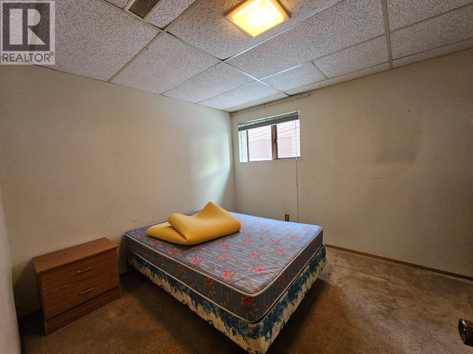 128 Kiskatinaw Crescent, Tumbler Ridge, BC - Indoor Photo Showing Bedroom