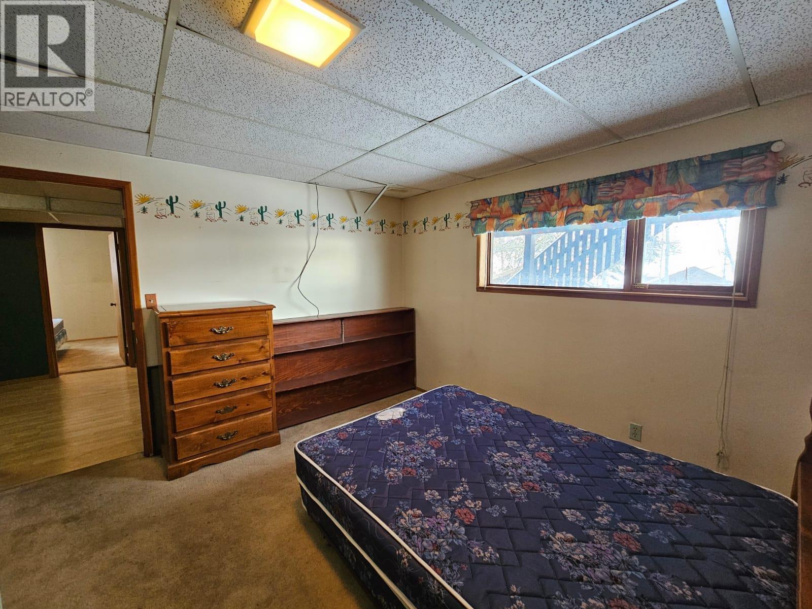 128 Kiskatinaw Crescent, Tumbler Ridge, BC - Indoor Photo Showing Bedroom