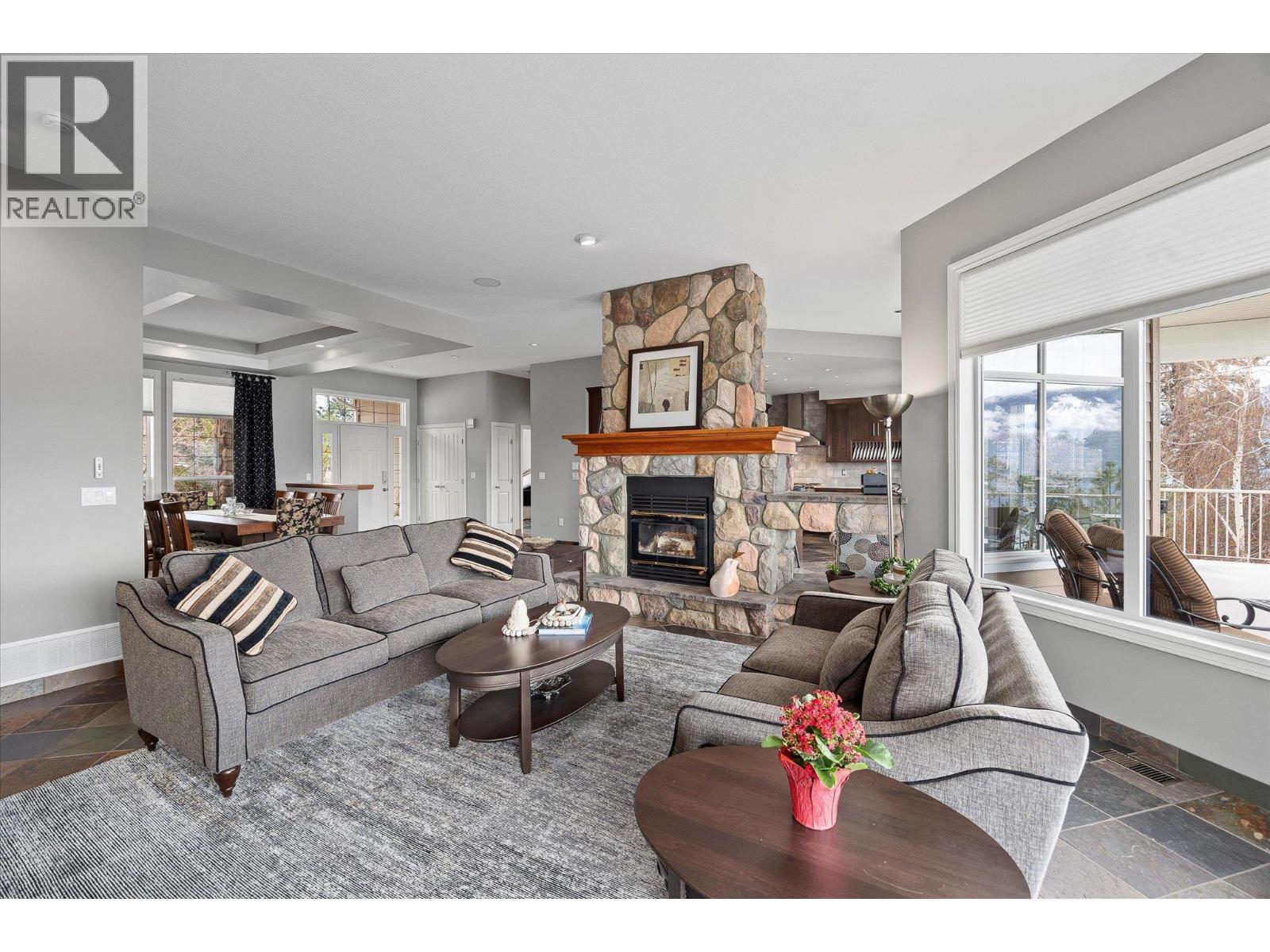 10726 Nighthawk Road Unit# 60, Lake Country, BC - Indoor Photo Showing Living Room With Fireplace