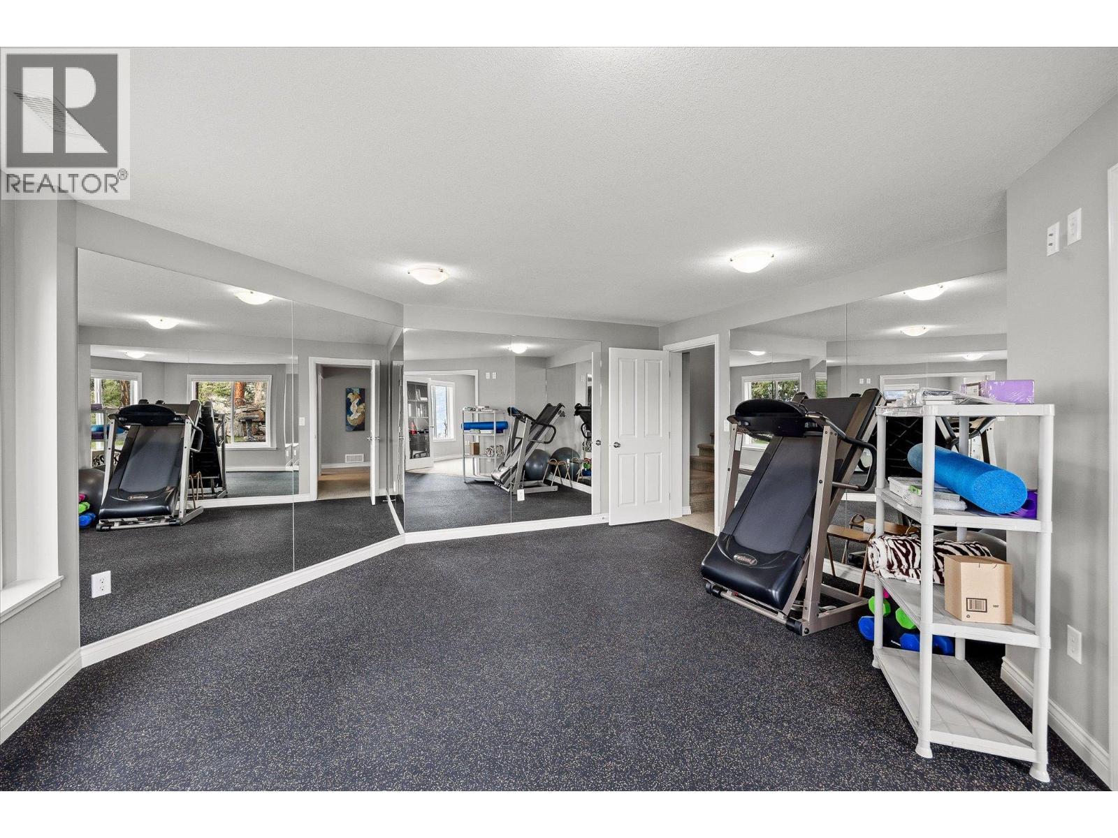 10726 Nighthawk Road Unit# 60, Lake Country, BC - Indoor Photo Showing Gym Room