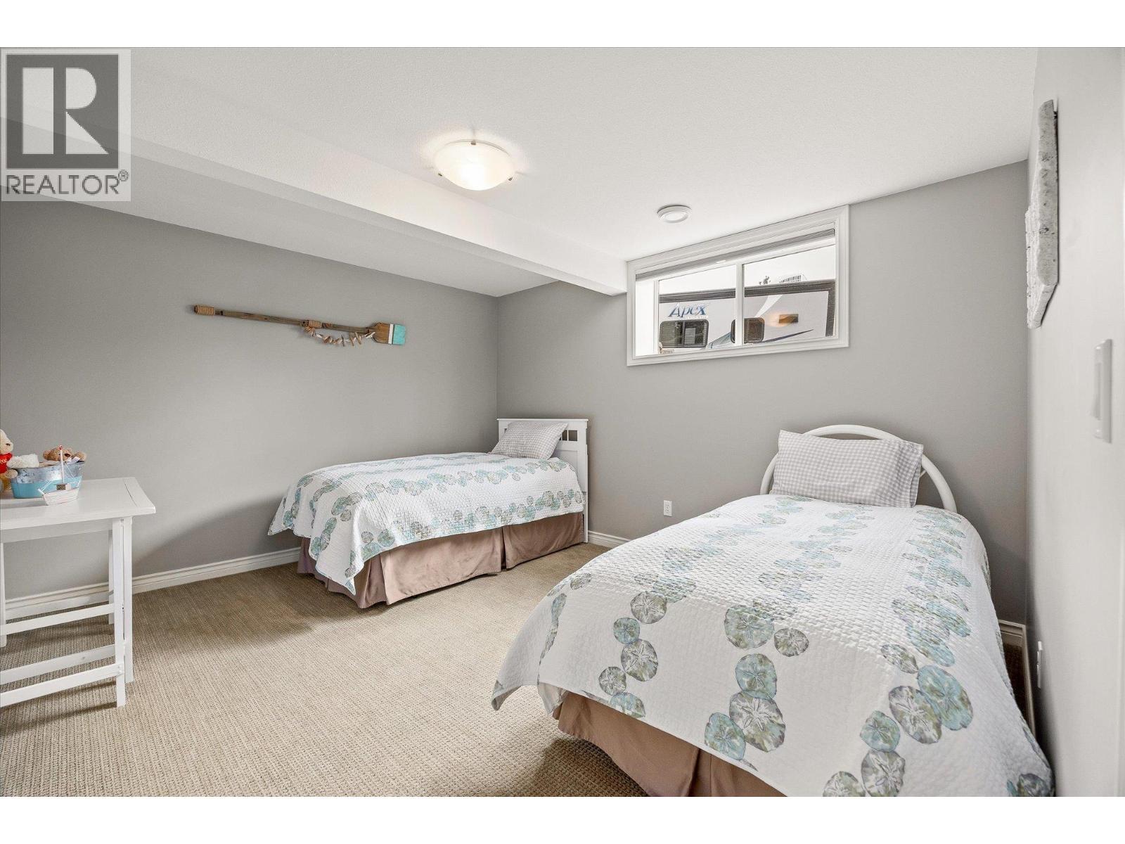 Downstairs Bedroom 2 - 10726 Nighthawk Road Unit# 60, Lake Country, BC - Indoor Photo Showing Bedroom