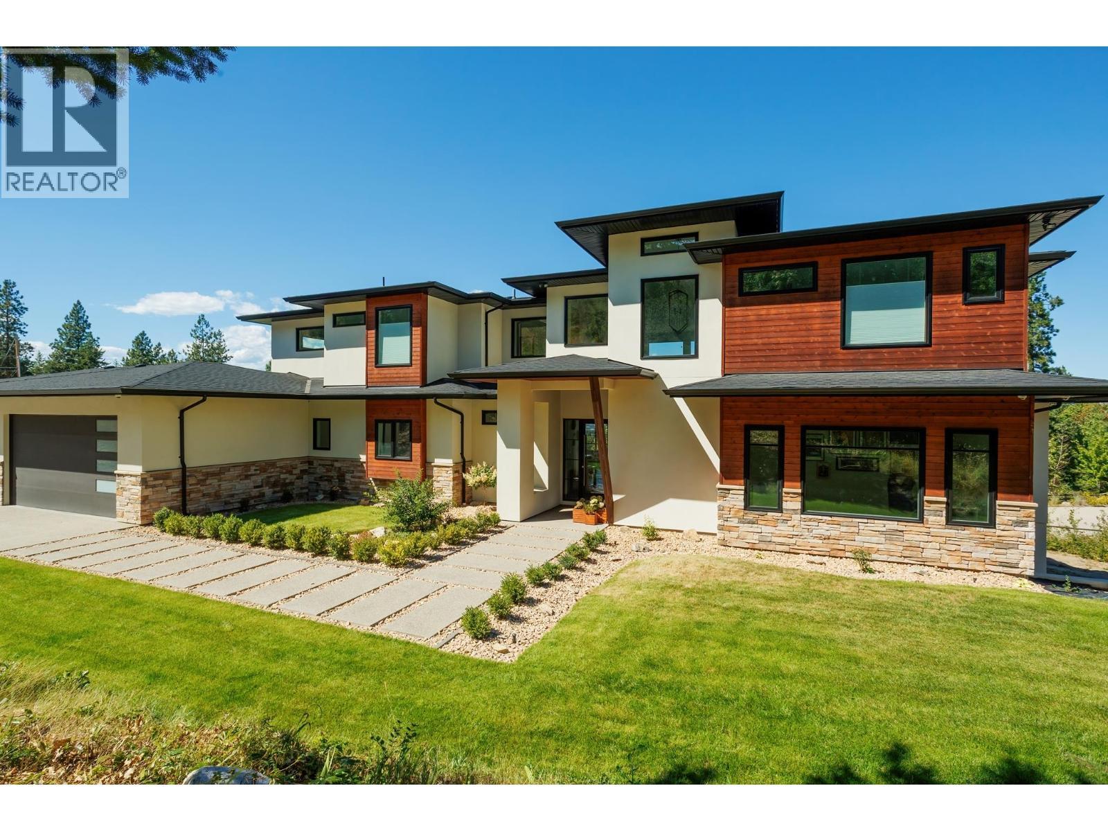 4451 Hayes Road, Kelowna, BC - Outdoor With Deck Patio Veranda With Facade