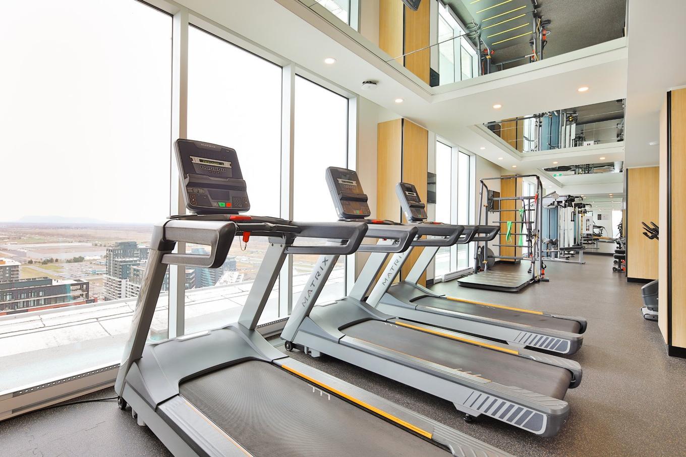 Exercise room - 2010-60 Rue De L'Éclipse, Brossard, QC - Indoor Photo Showing Gym Room