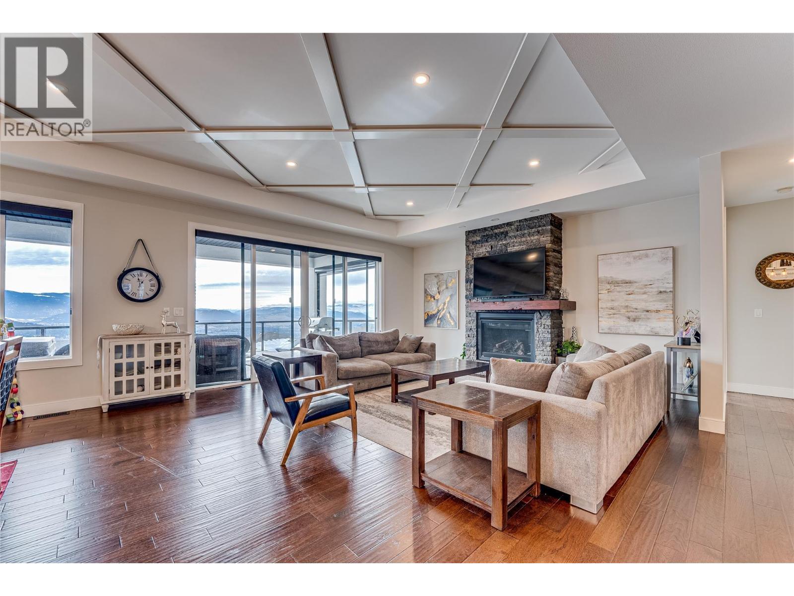7429 Sun Peaks Drive, Vernon, BC - Indoor Photo Showing Living Room With Fireplace