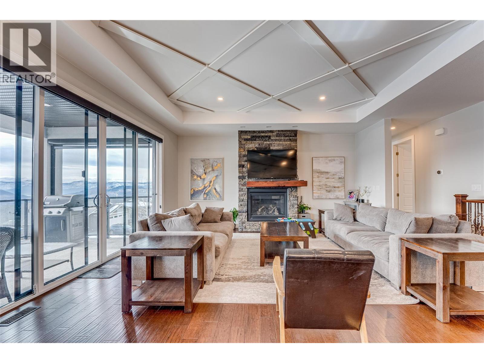 7429 Sun Peaks Drive, Vernon, BC - Indoor Photo Showing Living Room With Fireplace
