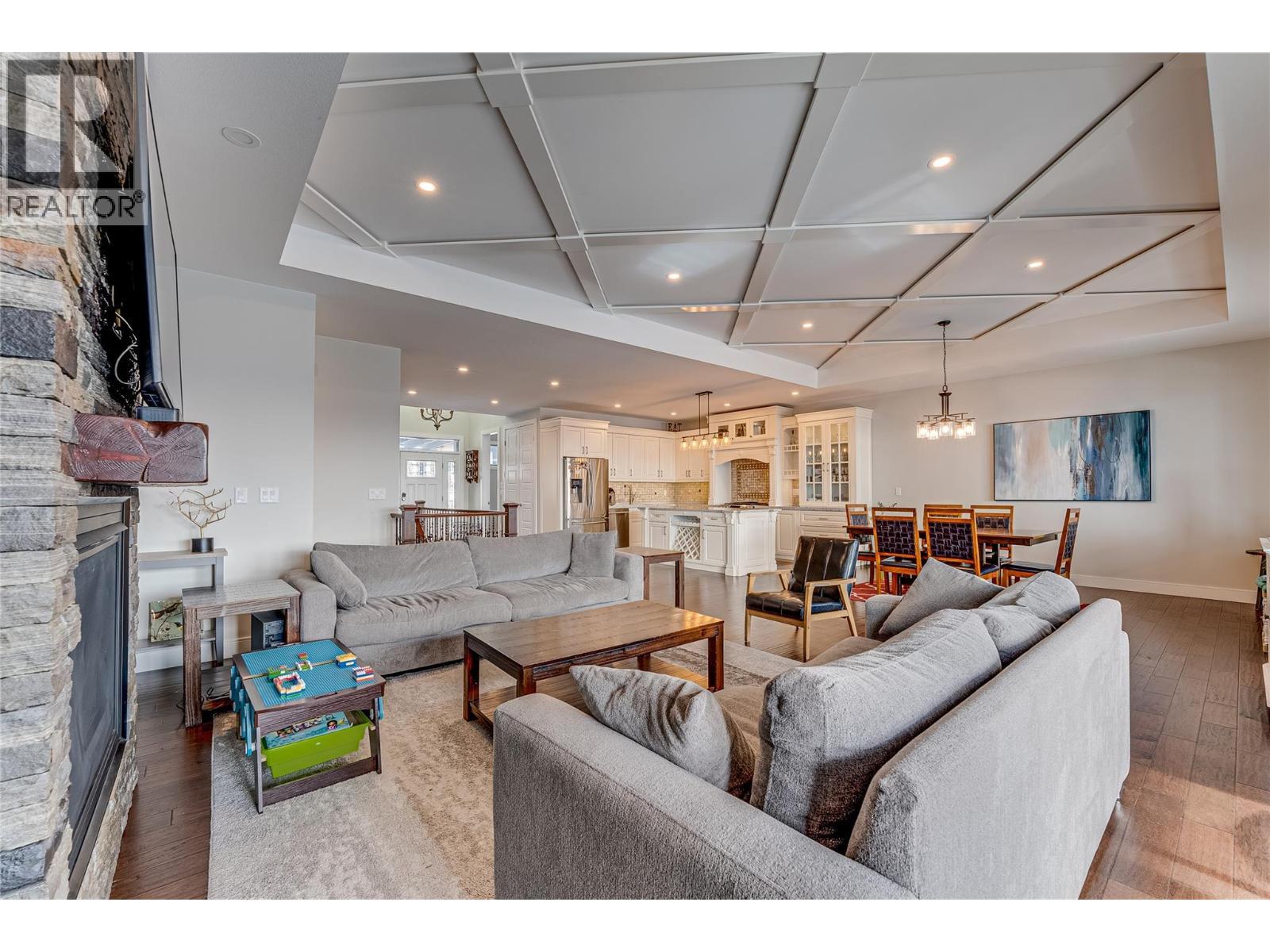 7429 Sun Peaks Drive, Vernon, BC - Indoor Photo Showing Living Room With Fireplace