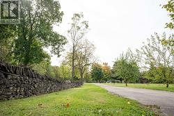 HISTORIC STONE WALL TO THE PRIVATE LANEWAY -