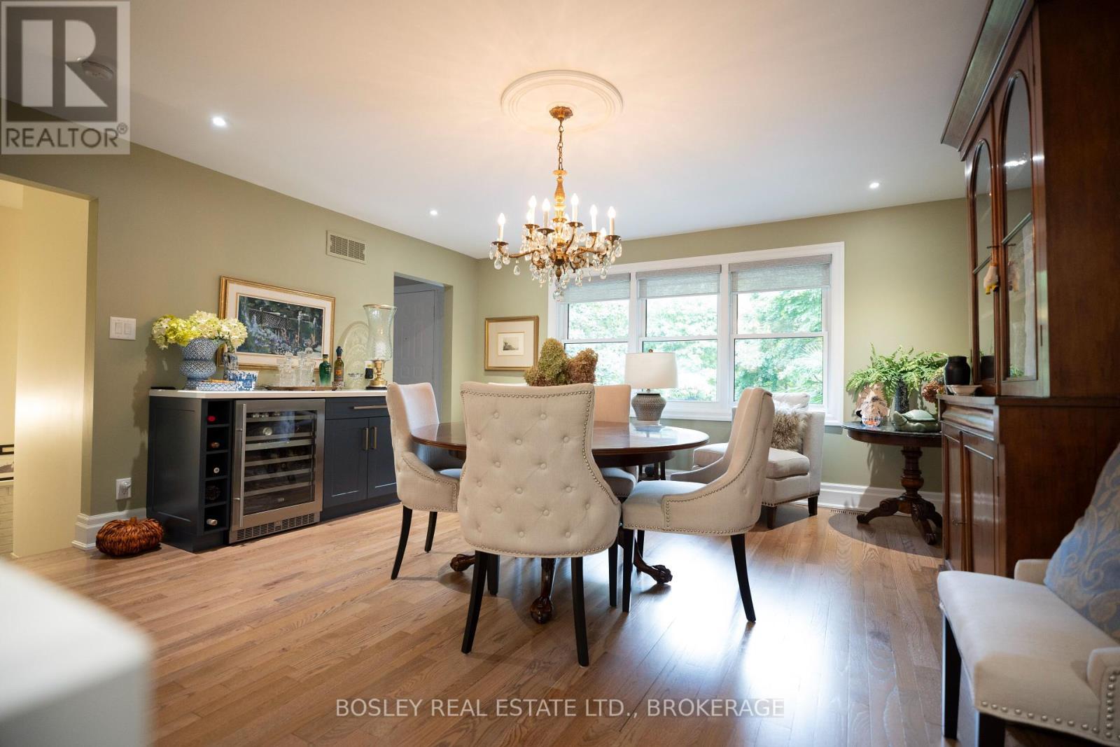 CUSTOM CABINET WITH BUILT IN COOLER - 14796 Niagara River Parkway, Niagara-On-The-Lake (Rural), ON - Indoor Photo Showing Dining Room