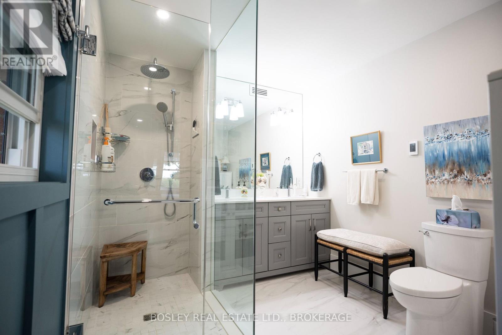 PRIMARY ENSUITE...GLASS SHOWER. - 14796 Niagara River Parkway, Niagara-On-The-Lake (Rural), ON - Indoor Photo Showing Bathroom