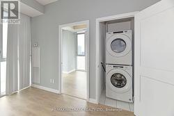 Laundry Closet W Stacked Whirlpool Washer/Dryer -