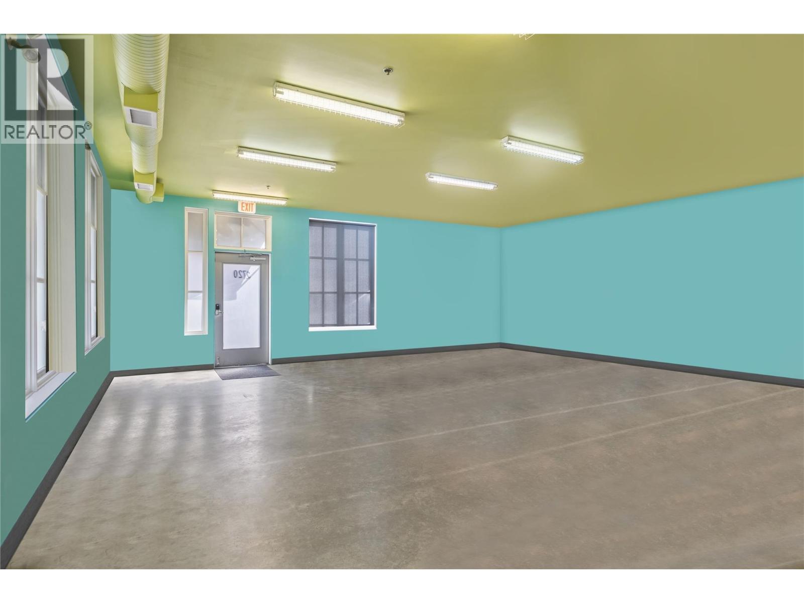 This photo has been modified to show the space empty - 2720 Tutt Street, Kelowna, BC