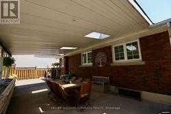 Back Covered Patio with Sunlights -