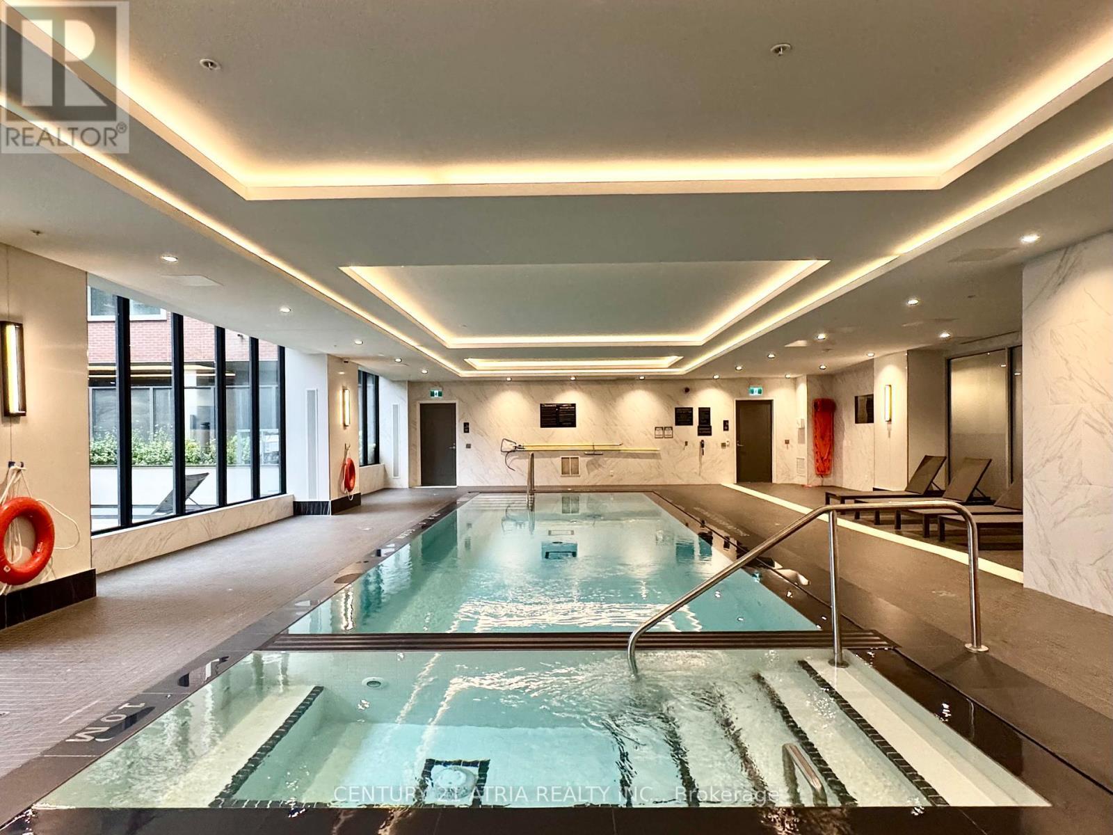 1003 - 33 Frederick Todd Way, Toronto, ON - Indoor Photo Showing Other Room With In Ground Pool