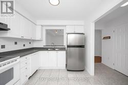 Pass through to sun filled living room -