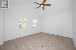 Primary bedroom vaulted ceiling and fan -