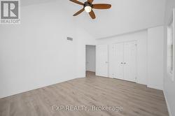 Primary bedroom fresh paint and airy -