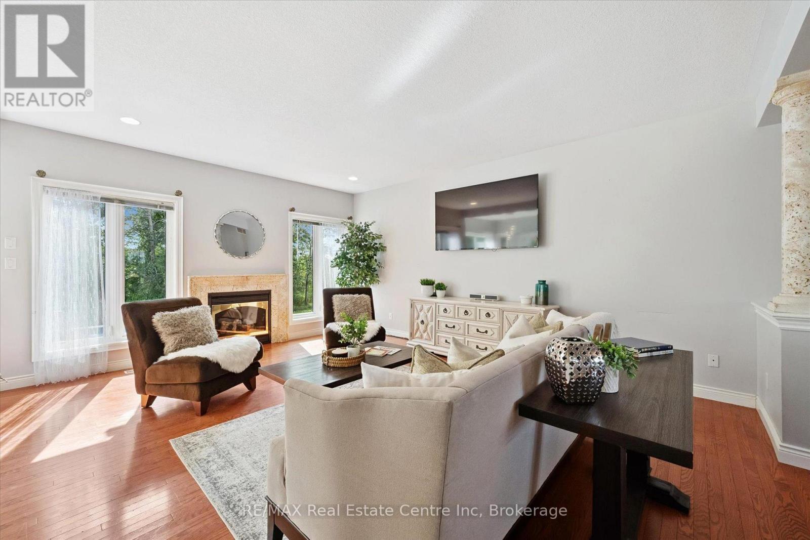 5946 Wellington Rd 86 Road, Woolwich, ON - Indoor Photo Showing Living Room With Fireplace