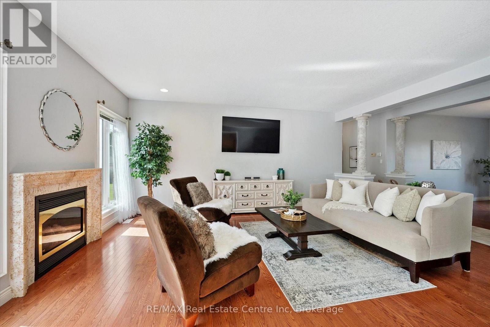5946 Wellington Rd 86 Road, Woolwich, ON - Indoor Photo Showing Living Room With Fireplace
