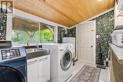 Main Floor Laundry/ Entrance to Backyard -